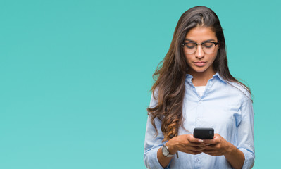 Poster - Young beautiful arab woman texting using smartphone over isolated background with a confident expression on smart face thinking serious