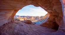 Arch Canyon Window To The Valley With The Bluesky And Colorful Sandstone Reflection With Sunray