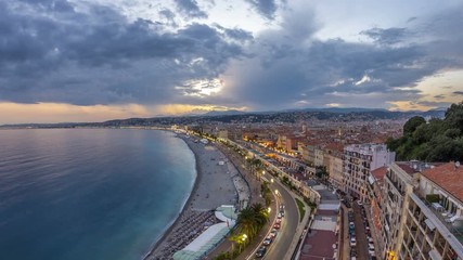 Wall Mural - Panorama over Nice city and Mediterranean Sea aerial day to night timelapse