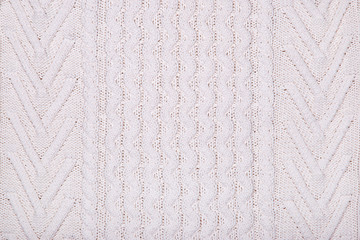 Wall Mural - White sweater knit textured background. 