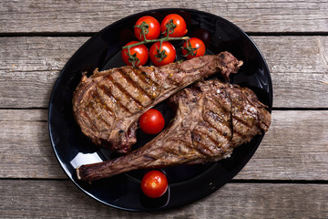 Wall Mural - Grilled beef tomahawk steak