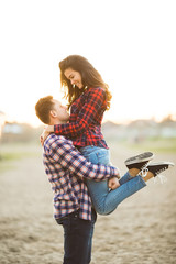 Loving couple embracing on the beach