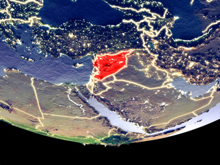 Wall Mural - Satellite view of Syria from space at night. Beautifully detailed plastic planet surface with visible city lights.