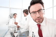 © ASDF - close up.businessman on the background of his office