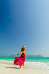 Wall Mural - Woman on holidays at the beach