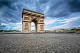 Fototapeta Paryż - Dark Clouds coming over the Arc de Triomphe in Paris, France