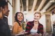 © ReeldealHD images - Smiling friends sitting at home