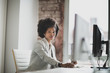 © ReeldealHD images - Portrait of businesswoman working on desktop computer in office