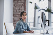© ReeldealHD images - Portrait of businesswoman working on desktop computer in office
