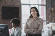 © ReeldealHD images - Portrait of businesswoman in a working office