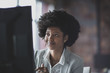 © ReeldealHD images - Female african american business executive working in an office on a desktop computer