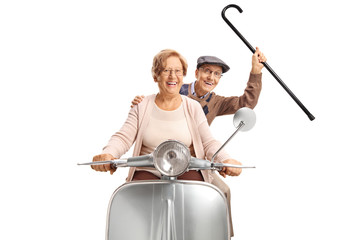 Poster - Cheerful senior couple riding a vintage scooter and holding a cane up