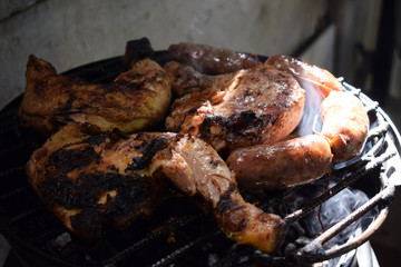 On the street they cook grilled meat, chorizo and chicken.