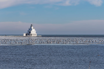 Poster - Lighthouse on lake Michigan.