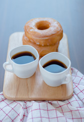 Wall Mural - Coffee cup with sugar donut