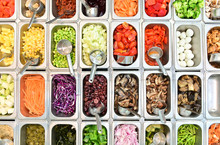 Top View Of Salad Bar With Assortment Of Ingredients