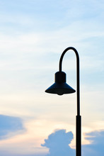 Modern Street Light Lamp In Countryside At Evening Time