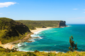 View onto Garie Beach from a higher angle in the Royal National Park near Sydney in summer with clear sky and blue sea (Sydney, Australia)