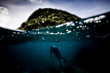 Freediving Below The Surface In Palau.