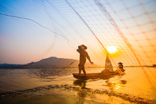 Fisherman On Boat River Sunset Asia Fisherman Net Using On Wooden Boat Casting Net Sunset Or Sunrise In The Mekong River