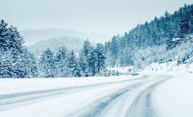 mountain road landscape covered in snow in winter