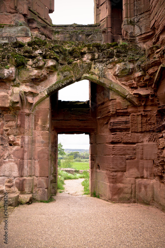Fotografie, Obraz Entrance door on ancient medieval castle with view to outside