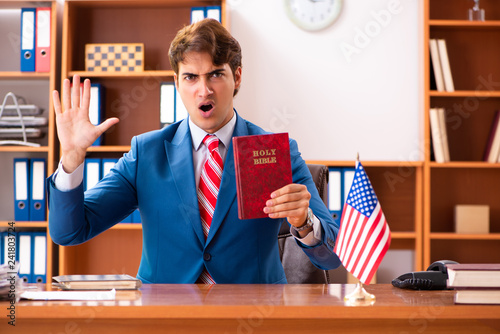 Fotografía Young handsome politician sitting in office