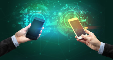 close up of two smartphones, business and communication concept