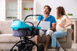 © Elnur - Young parents with baby expecting new arrival