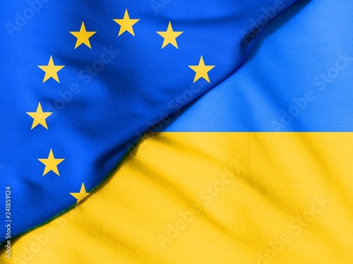 Fotografie, Obraz Two flags. Flag of the European Union. Flag of Ukraine.