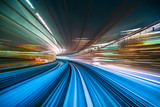 Fototapeta  - Motion blur from Yurikamome Line moving inside tunnel in Tokyo, Japan