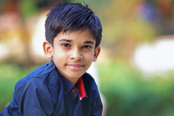 Wall Mural - Portrait of Indian Little boy Posing to Camera with Expression