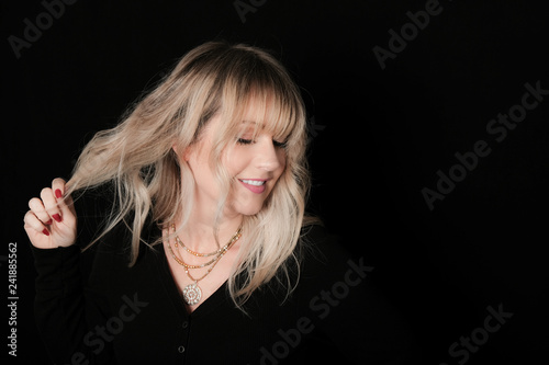 Fotografie, Obraz Woman With Rooty Blonde Modern Shag Haircut