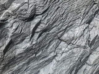 Wall Mural - natural black stone surface texture wall background.