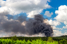 Black Fire Smoke In A Beautiful Summer Sky After A Highway Truck Accident Near Dimitrovgrad In Bulgaria, August 2018