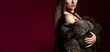 © Dmitry Lobanov - Young sexy fashion woman in fur coat and underwear on dark red. Banner