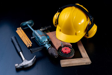 Tools for a carpenter on a workshop table. Accessories for a production worker.