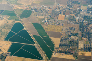 Wall Mural - aerial view of the green field in country area 