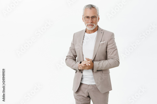 Fotografía Portrait of smart and handsome intelligent senior male professor in stylish suit
