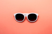 Women's Sunglasses In White Rim On Living Coral Background