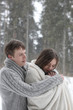 © alexkich - pair of lovers on a date winter afternoon in a snow blizzard