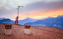 TV Antenna On The Roof Of An Italian House, Sunset