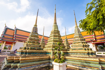 Pagoda buddha temple at Wat pho one of attraction sightseeing in morning with blue sky cloud