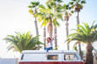 © simona - Happiness attitute for middle age cheerful nice woman enjoying travel with old red vintage van in tropical place for vacation or wanderlust lifestyle - trend transport vehicle concept