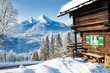 Winter scenery with mountain hut in the Alps