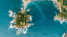 Aerial View Of Charming Coastal Mediterranean Small Town On Sicily Island, Taormina. Beaches Of Taormina And South Italy.Travel Destination, Vacation In Italy Concept.Aerial Landscape Of Bella Isola