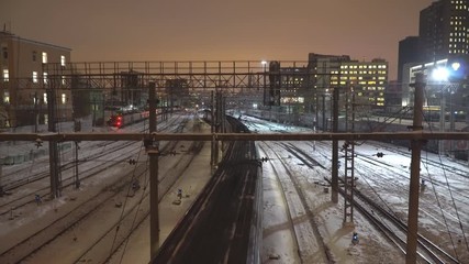 Wall Mural - Night movement of trains on the big and important railway direction