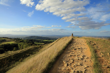 stone path on a hill along the Cotswold Way, England, UK