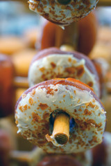 Wall Mural - Fresh white chocolate donuts