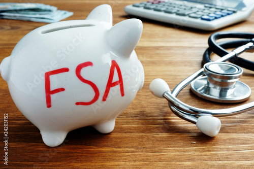 Fotografía Piggy bank with words Flexible Spending Account FSA.